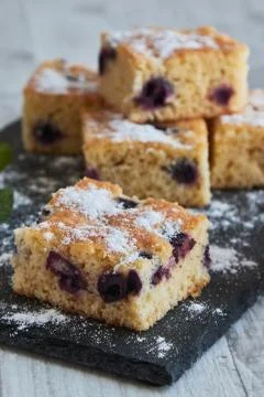 Fresh tassty cherry fruit sponge cake with sugar Stock Photos
