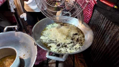 Fresh Thai Funnel Cake Frying in Hot Oil at Night Market Stock-Footage 340997057
