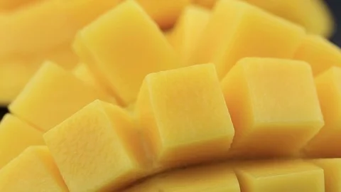 Fresh thai yellow mango background, rotates Stock Footage 78447771
