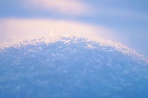 Fresh thick layer of snow close-up. Winter landscape with a blurry background Stock Photos