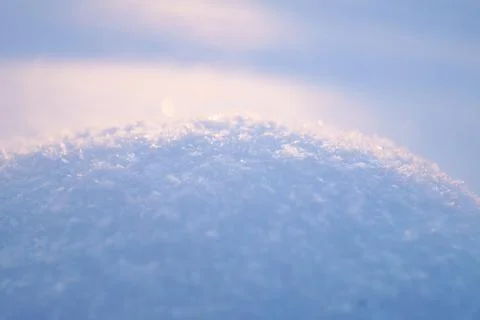 Fresh thick layer of snow close-up. Winter landscape with a blurry background Stock Photos
