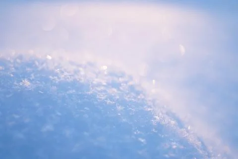 Fresh thick layer of snow close-up. Winter landscape with a blurry background Stock Photos