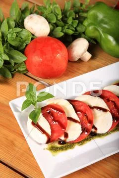 Fresh tomato and mozarela cheese Stock Photos