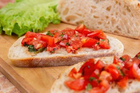 Fresh Tomato Bruschetta on Rustic Bread Stock Photos