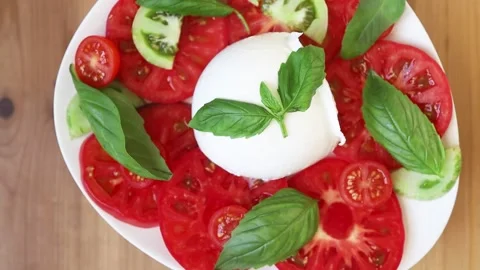 Fresh Tomato Mozzarella Salad with Basil.  Stock Footage 313837756
