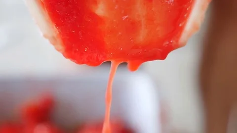 Fresh tomato pulp flowing- macro Stock Footage 85223878