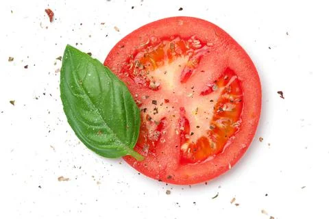 Fresh Tomato Slice With Basil And Spices Stock Photos