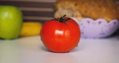 Fresh tomato on the table in the kitchen Stock Footage 129092138