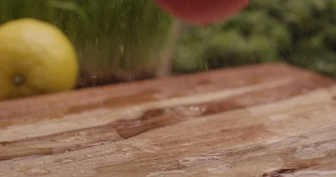 Fresh tomato tomatoes bouncing onto cutting board 3 Video stock 123847097