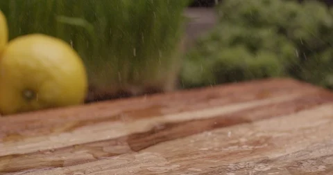 Fresh tomato tomatoes bouncing onto cutting board 1 Stock Footage 123847131