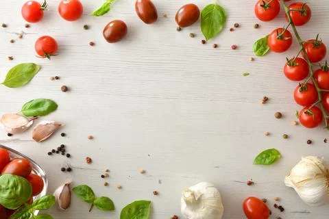 Fresh Tomatoes and Basil Border Background Stock Photos