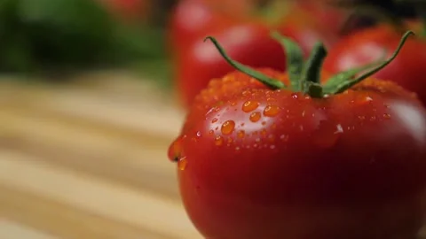 Fresh Tomatoes close up dew drop 動画素材 157162604