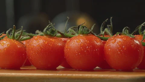 Fresh tomatoes with drops of water Stock Footage 172443834