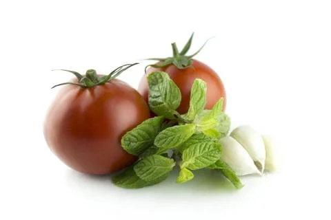 Fresh tomatoes with Garlic and Mints Stock Photos