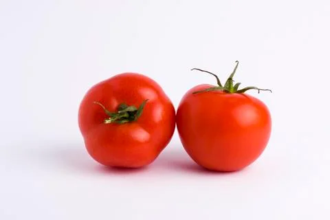 Fresh tomatoes isolated on white background Stock Photos