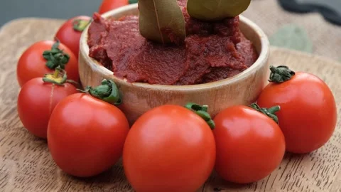 Fresh tomatoes paste Stock Footage 260162287