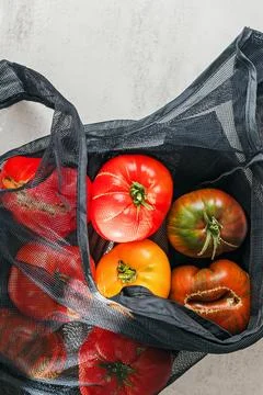 Fresh Tomatoes in Reusable Mesh Bag Stock Photos