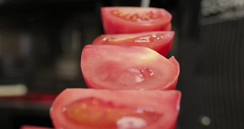 Fresh tomatoes on a skewer. Chef prepares vegetables on charcoal grill in a Stock Footage 262887465