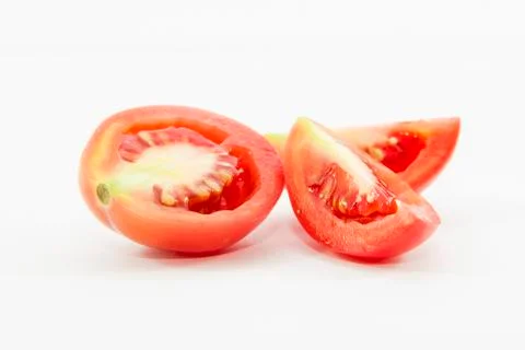 Fresh tomatoes sliced in two size Stock Photos