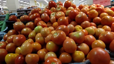 Fresh tomatoes at a supermarket Stock Footage 122921349
