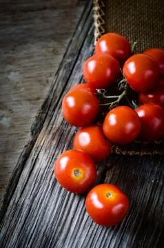 Fresh tomatoes on a table Stock Photos
