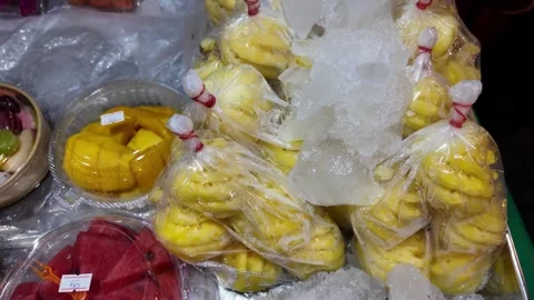 Fresh Tropical Fruit Packed in Plastic Bags at Thai Food Market Stock-Footage 343763838