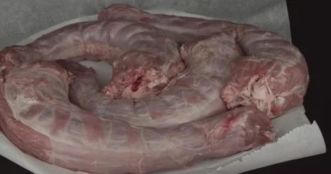 Fresh turkey necks closeup rotating Stock Footage 164471390