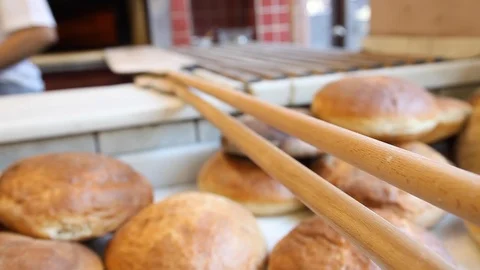 Fresh Turkish bread with baker on the background Stock Footage 111331506