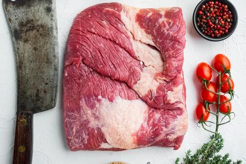 Fresh uncooked raw meat beef brisket,with ingredients for smoking making Stock Photos