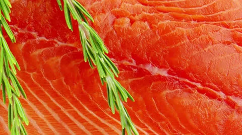 Fresh uncooked red fish fillet and rosemary Stock Footage 25112574