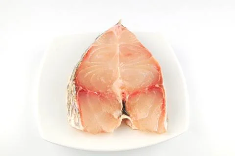 Fresh uncooked red fish meat fillet on white background Stock Photos