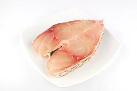 Fresh uncooked red fish meat fillet on white background Stock Photos
