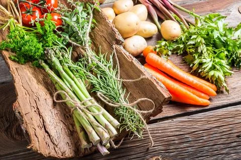 Fresh various vegetables on bark Stock Photos