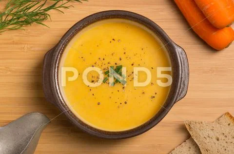 Fresh vegan carrot and potato soup Stock Photos