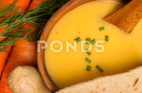 Fresh vegan carrot and potato soup Stock Photos