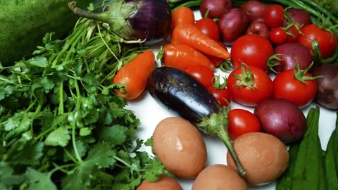 Fresh Vegetable Assortment with Eggs Footage, A colorful assortment of fres.. Stock Footage 305031858