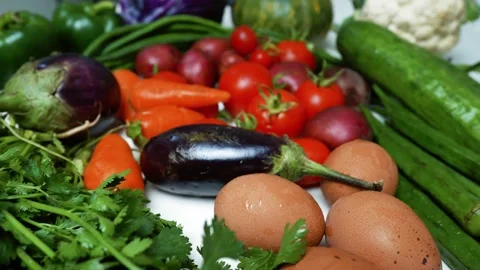 Fresh Vegetable Assortment with Eggs Footage, A colorful assortment of fres.. 스톡 동영상 305031887