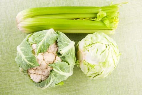 Fresh vegetable on green background. Stock Photos