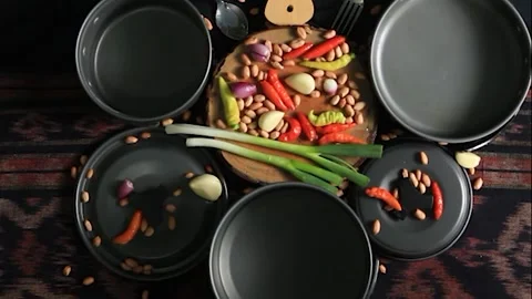 Fresh vegetable ingredients with kitchen utensils ready to cook. Stock Footage 152255568