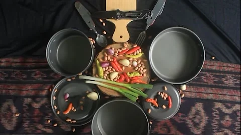Fresh vegetable ingredients with kitchen utensils ready to cook. Stock Footage 152255588