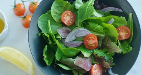 Fresh vegetable salad from above Stock Footage 99732877