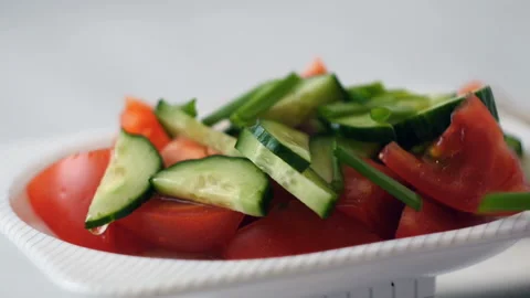 Fresh vegetable salad Stock Footage 168374360