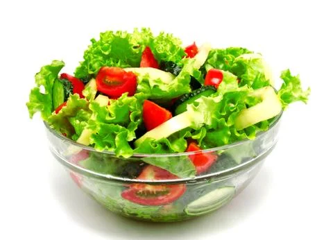 Fresh vegetable salad isolated on a white Stock Photos
