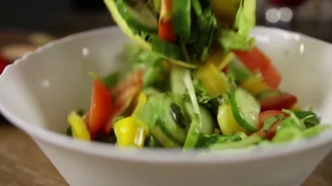 Fresh vegetable salad preparation. Stock Footage 305808442