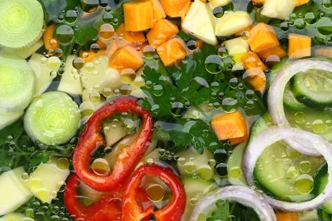 Fresh vegetable soup close-up background Stock Photos