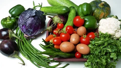 Fresh Vegetables and Eggs Assortment, Variety of fresh vegetables and eggs .. Stockbeeldmateriaal 305038778