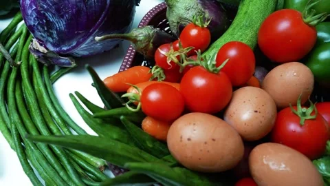 Fresh Vegetables and Eggs Assortment, A colorful assortment of fresh vegeta.. 動画素材 305039451