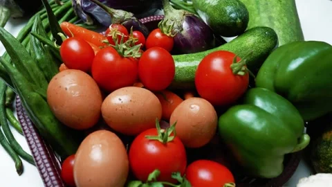 Fresh Vegetables and Eggs Assortment, A colorful assortment of fresh vegeta.. 動画素材 305039516
