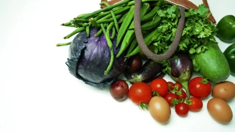 Fresh Vegetables and Eggs in Cloth Bag, A variety of fresh vegetables and e.. 스톡 동영상 305045455