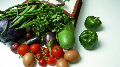 Fresh Vegetables and Eggs from Cloth Bag, A variety of fresh vegetables and.. 動画素材 305045661